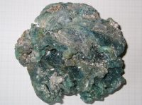 Large lump of glass waste, showing the top surface. Weight 1.5kg and length 17.5cm.