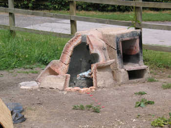 6. A view of the furnace and oven in mid summer 2005.