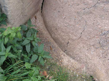 13. Build up of clay, sand and grit at the base of the furnace.