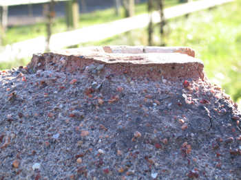 24. Erosion at the top of the furnace (compare with Photograph 20).