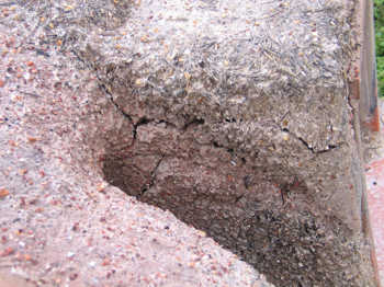 25. Erosion in the area between the furnace and the oven.
