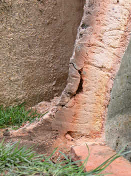 3. Detail showing the build up of material at the base of the furnace wall.