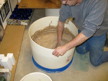 4. Mixing the clay with water.