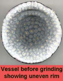 Vessel with uneven rim before grinding