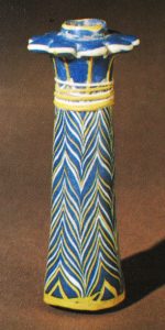 An original palm kohl-tube, c.1400-1225 BC. From Goldstein, S. (1979) 'Pre-Roman and Early Roman Glass in The Corning Museum of Glass' Corning: New York, cat. no. 24, inv. no. 71.1.4, showing lead antimonate yellow decoration