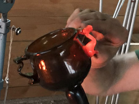 Two-handled beaker: adjusting the final shape of the handle