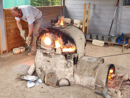 Steve coaxing the furnace to reach a higher temperature