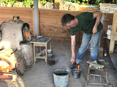 Emptying the pots at the end of the day (Photo © Fiona Rashleigh)